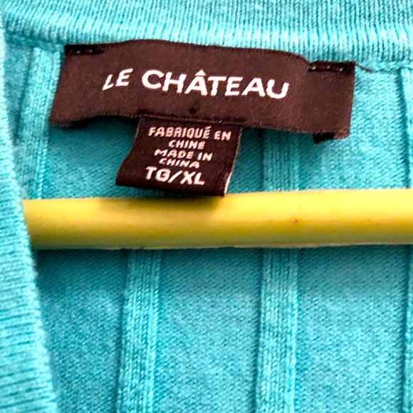 Turquoise short sleeve sweater from Le Chateau. - Picture 2 of 4